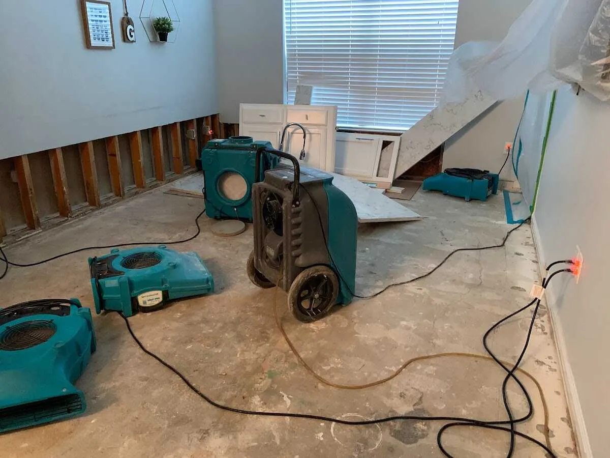Dehumidifier in flood-cut room for Water Damage Restoration in Maywood